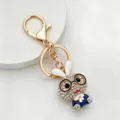 Portachiavi coniglietto metallo strass occhiali simpatico ciondolo borsa dorato nuovo - bianco-blu