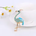 Close-up of a cute rhinestone flamingo bag charm and car key ring detail shot on white background. - Lake Blue