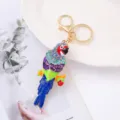 Lindo llavero de loro con diamantes de imitación aleación metal esmalte animal bolso - Azul