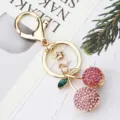 Porte-clés cerise en strass mignon métal doré pendentif sac à main accessoire élégant - Rose
