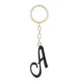 Porte-clés en métal doré avec pendentif lettre A en émail noir, charmant bijou de sac élégant. - Lettre A