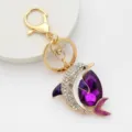 Beautiful rhinestone dolphin metal keychain bag pendant detailed view for stylish decoration. - Dolphin 8