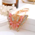 Porte-clés en métal papillon exquis avec des pierres roses et des strass brillants. - Collier Papillon Dégradé Jaune Style 8