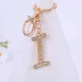 Gold-tone rhinestone letter I keychain pendant, sparkling crystal alphabet keyring accessory. - Letter I