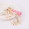 Gold rhinestone letter J keychain with pink tassel, stylish bag charm and ideal gift. - Letter J