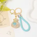 Exquisite rhinestone money bag keychain detail, luxury metal keyring and blue braided leather cord. - Color 2 with Leather Strap