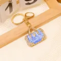 Luxus kreative Öltropfen Handtasche Schlüsselanhänger Strass stilvoller Metalltaschenanhänger. - Saphirblau