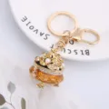 Close-up detail of Chinese style cornucopia keychain pendant with sparkling rhinestones. - Color 5