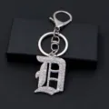 Porte-clés lettre D gothique en strass argenté métallique brillant pour sac à main - Lettre D