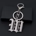 Silver rhinestone gothic letter keychain detail close-up view sparkling crystal charm accessory - Letter W