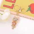 Delizioso portachiavi a forma di gatto in strass con gemma rosa e anello metallico lucido. - Gatto Portafortuna Gemma Rosa / Rosa