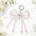 Crystal beaded bow keychain and bag charm with sparkling pink stones and silver ring. - Pink