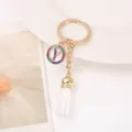 Gold letter Y keychain with colorful rhinestones and white tassel bag pendant fashion accessory. - Letter Y