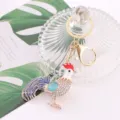 Rhinestone rooster keychain detail showcasing the sparkling crystals and colorful enamel finish. - Chicken 1