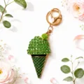 Rhinestone green ice cream cone keychain with metal keyring and floral charm pendant. - Green