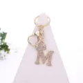 Gold rhinestone letter M keychain with crown pendant for bag accessory and stylish keyring decor - Letter M