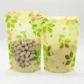 Hochwertiger Standbeutel mit Blumendruck und Fenster für Lebensmittelverpackung - Standbeutel / 18x26+4cm (100 Stück/Packung)