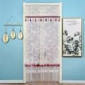 Detailed view of the double-layer lace door curtain with decorative tassels and fringe. - 90*220cm / Misty Purple (Double Opening with Hook and Loop)