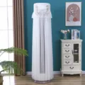 Detailed view of the white lace cylindrical standing air conditioner dust cover with bow. - Butterfly Dance Gauze White