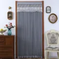 Grey sheer door curtain with elegant lace embroidery, vintage home decor scene detail shot. - Jin Simei Grey Privacy Door Curtain
