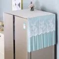 Detail view of a stylish lace refrigerator dust cover with pleated design and floral lace. - Moonflower Blue