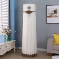 Vertical dust cover detail scene showing elegant beige lace tulle design for home decor use. - Universal Air Conditioner Cover (Height 180cm) / Milan Fashion Coffee with Lining