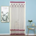 Detailed view of the mesh door curtain featuring embroidered pineapple patterns and purple borders. - Purple Pineapple Double Gauze with Velcro