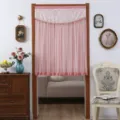 Detailed view of pink lace door curtain hanging in a cozy bedroom doorway setup, elegant. - Width 80 * Height 120 cm / Candy Pink