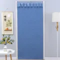 Detailed view of the thickened quilted thermal door curtain in blue with delicate lace trim. - 120*220cm / Padded Cotton Door Curtain - Blue