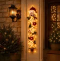 Leuchtende Weihnachtsdeko für die Tür mit Schneemann und Schneeflocken - Schneemann-Stil