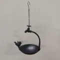 Detailed view of a black metal hanging bird feeder with creative faucet design for garden decor - Matte Black Faucet Style