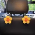 Leuke bloem autostoel rugleuning haak, multifunctionele hoofdsteun hanger, gele auto decoratie. - Paar / Geel