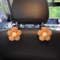 Leuke bloem autostoel rug haak multifunctionele auto opslag hanger interieur decoratie accessoire - Paar / Bruin
