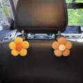 Leuke bloem autostoel hoofdsteun haak achterbank organizer hangende opbergdecoratie - Paar / Bruin & geel