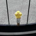 Cute yellow chick bicycle tire valve cap decorative air nozzle accessory for bike. - Headphone Chicken