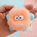 Cute fluffy monster car air vent clip, orange plush decoration with big eyes and blue accents. - Four-Legged Monster / Orange