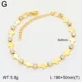 Bracelet en acier inoxydable croix dorée détail, pierres zirconia brillantes, design élégant. - Boucle Dorée Type 2