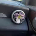 Car air vent perfume clip with purple flowers and cute glass bottle for fresh interior decor. - Begonia Flower / Purple