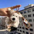 Cute West Highland White Terrier plush keychain bag charm with knit hat and scarf accessory. - Khaki Scarf Khaki Hat Westie Brown Braided Lanyard