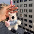 Cute white dog plush keychain with blue sweater and pink bunny, fluffy toy bag charm gift. - Blue Clothes Hugging Rabbit Westie Pink Braided Lanyard