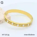 Bracelet jonc ouvert en acier inoxydable avec strass, détail plaqué or 18k chic. - Style 7
