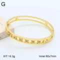 Bracelet jonc ouvert en acier inoxydable doré avec des pierres zirconium, taille 60x7mm. - Style 9