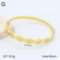 Bracelet jonc en acier inoxydable doré avec motifs d'yeux en cristal et dimensions. - Or 18 carats / 4