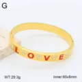 Bracelet manchette Love en acier inoxydable plaqué or 18k avec cristaux étincelants. - Style 19