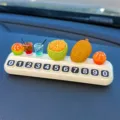 Tarjeta de estacionamiento temporal de coche con decoración de frutas en miniatura. - Set de jackfruit, naranjas, bebidas y tarjeta de aparcamiento