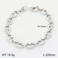 Vue détaillée du bracelet en chaîne en acier inoxydable, montrant la texture des maillons. - Style Couleur Acier 4