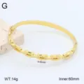 Vue détaillée du bracelet en acier inoxydable doré avec cristaux et dimensions. - Or 18 carats / 18