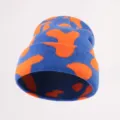 Blue and orange cow print knitted beanie, cozy winter warm hat for men and women. - Blue