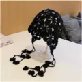 Black crochet hollow flower tassel beanie hat, handmade knit floral skull cap for women. - Black