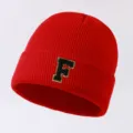 Red knitted beanie hat featuring a stylish letter F patch, warm winter cuff cap for daily wear. - Letter F
